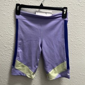 Nike one girl’s tight fit mid rise 9” shorts. Purple/ green. Size L